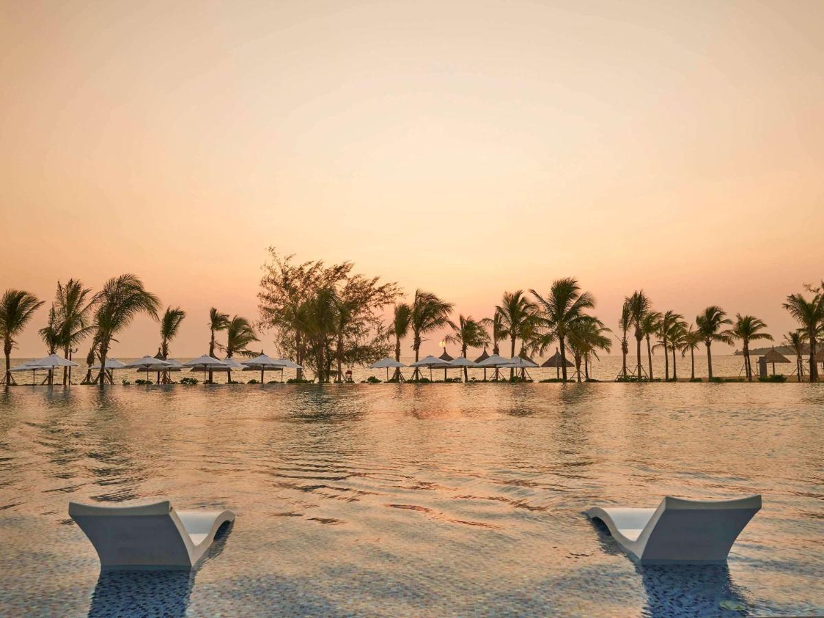 Moevenpick Villas & Residences Фукуок Екстер'єр фото Sunset at the beach